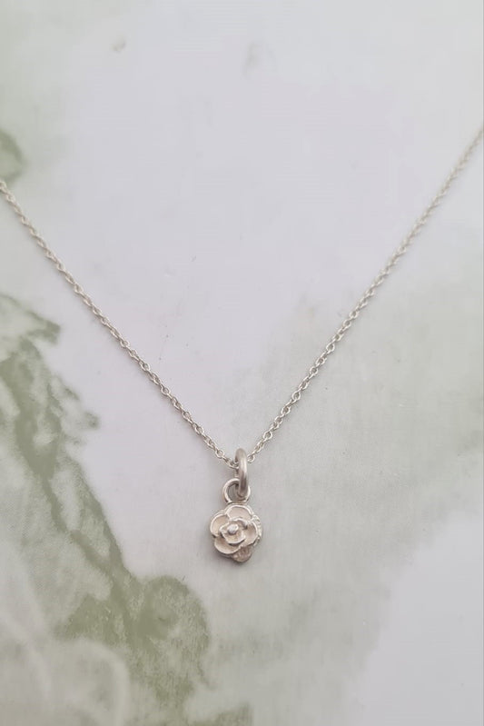 Handmade Sterling Silver Rose pendant.